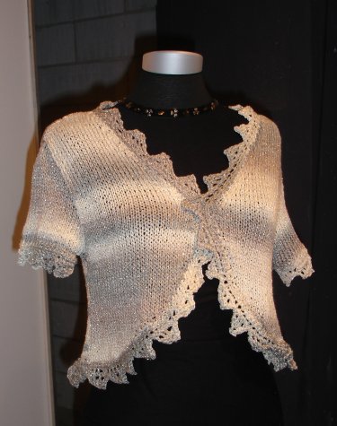  14501808 Bolero med blonde slges uden tilhrende garn 